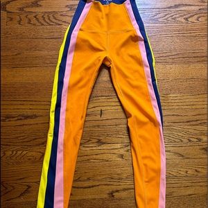 Splits59 Orange Leggings with Pink, Navy & Yellow Side Stripes